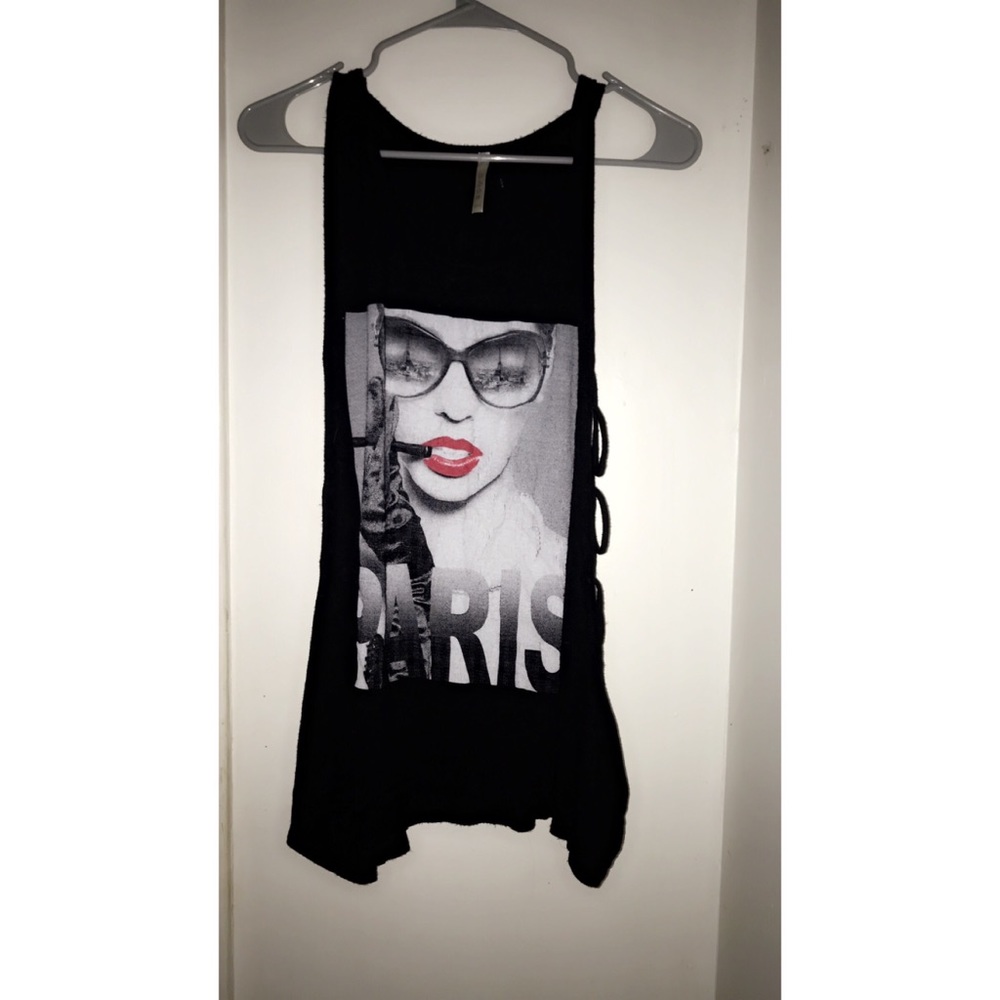 Black top shirt fits like a size S and M